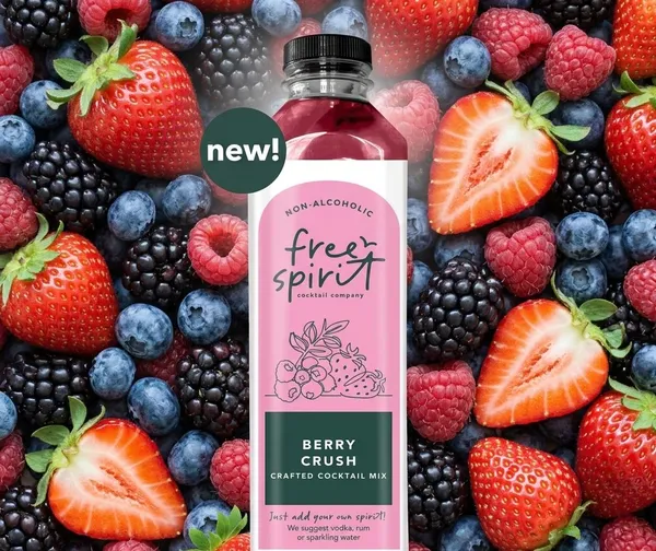 Berry Crush bottle on a bed of its fresh ingredients